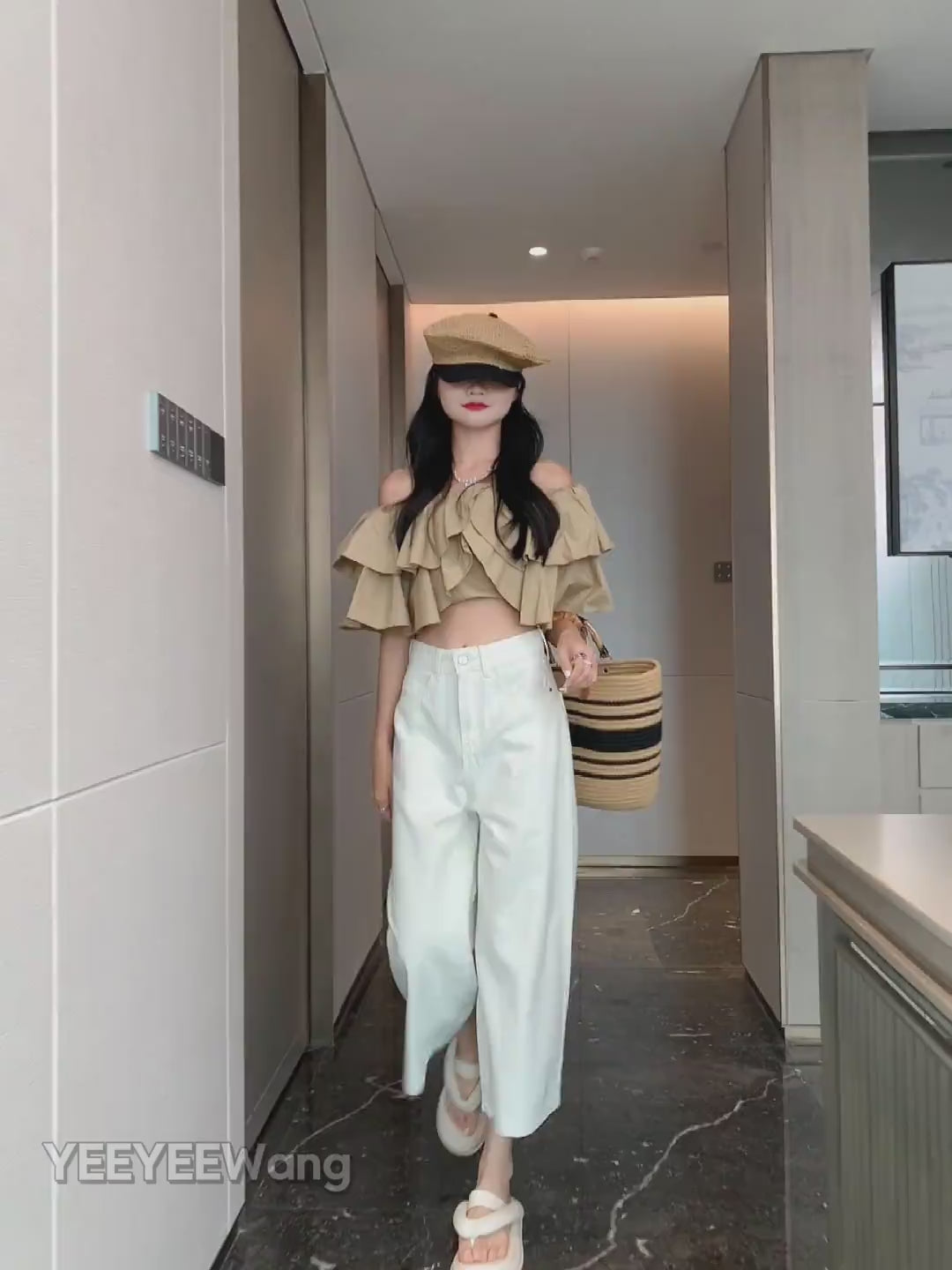 YEEYEEWang Wide-Leg jeans in Ivory video, Asian model walks forward and turns as camera moves in on waist and leg details, showing loose drape